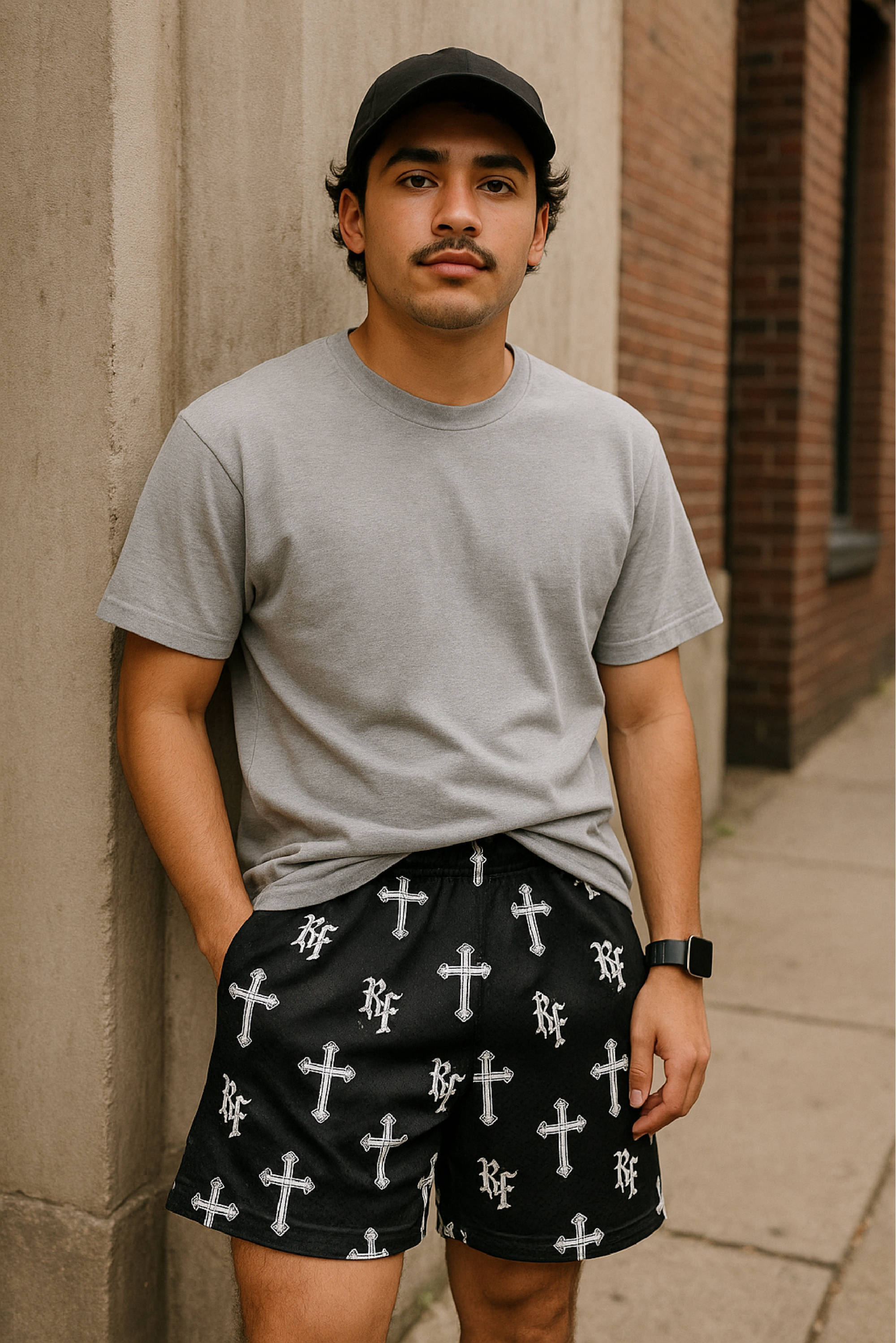 Man wearing RF-Wear Men's Mesh Cross Shorts in Black 
