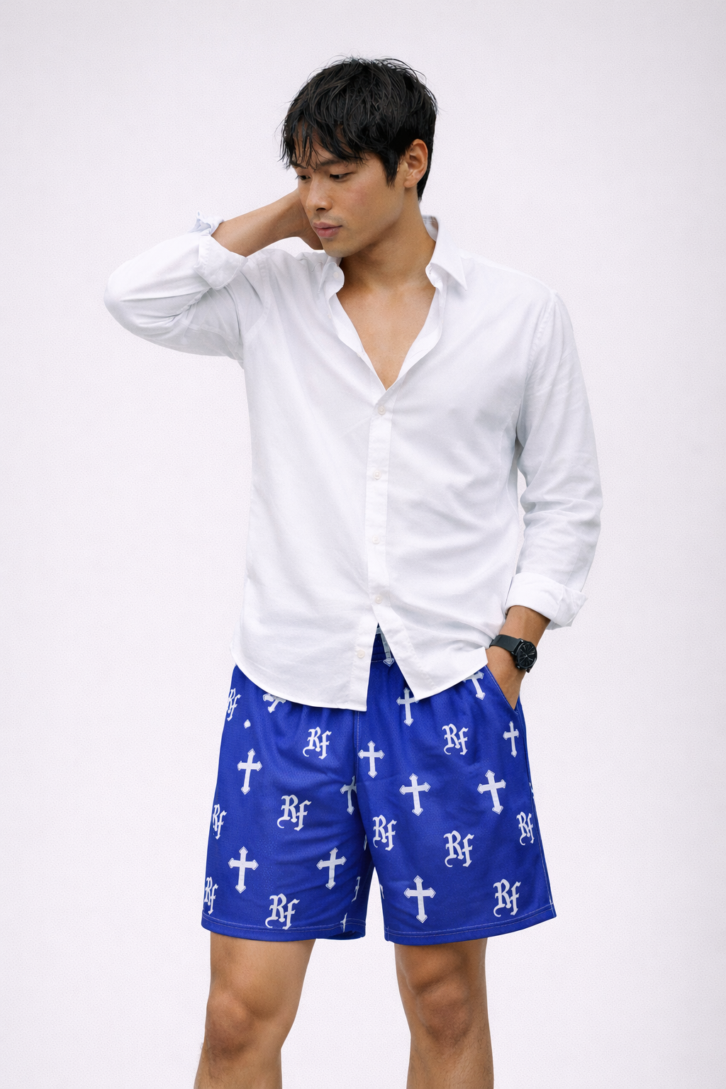 Man wearing a dress shirt and RF-Wear Men's Mesh Cross Shorts in Blue