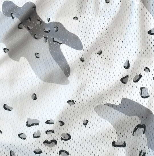 Close-up of RF-Wear Men's Mesh Desert Camo Shorts in White 