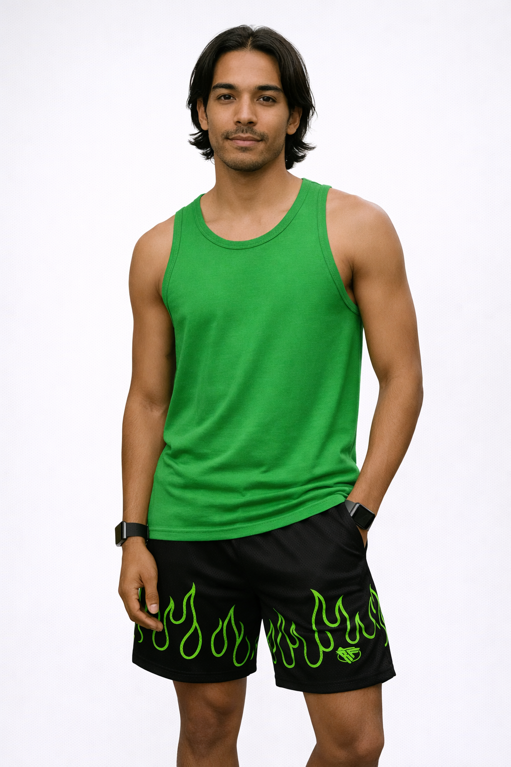 Man wearing a green tank top and RF-Wear Men's Mesh Fire Shorts  in Black/Green