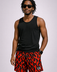 Man wearing a black tank top and RF-Wear Men's Mesh Flame Shorts in Black/Red