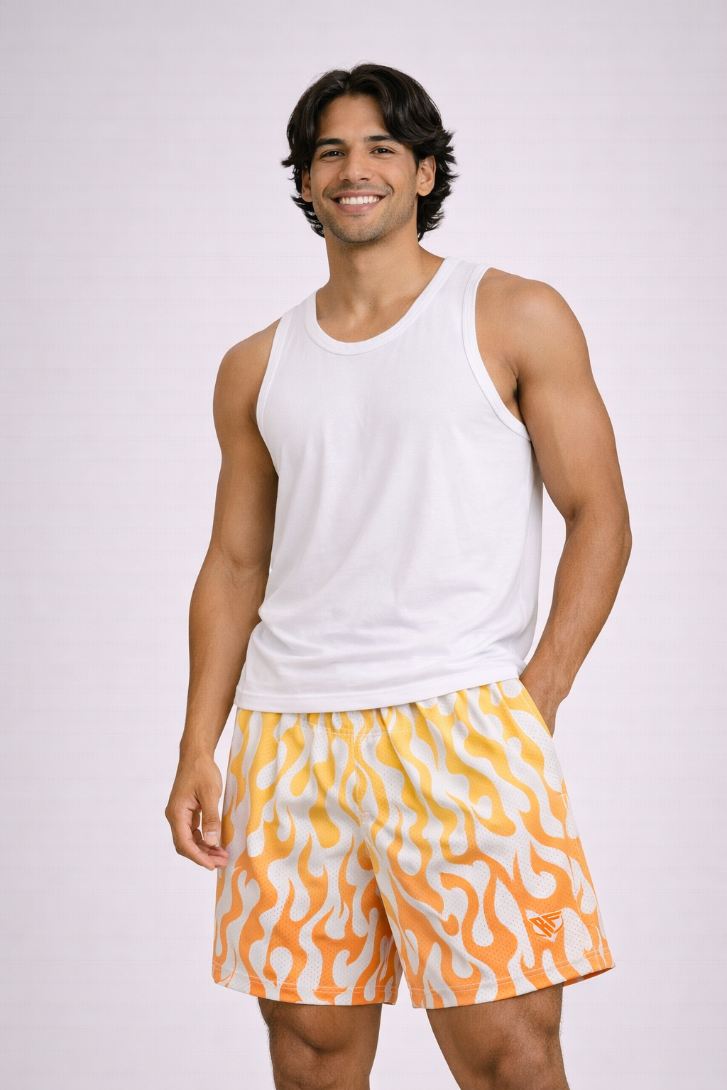 Man wearing a white tank top and RF-Wear Men's Mesh Flame Shorts in White/Orange 