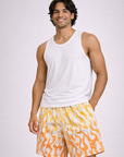 Man wearing a white tank top and RF-Wear Men's Mesh Flame Shorts in White/Orange 
