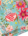 Close-up of RF-Wear Men's Mesh Floral Shorts in Teal/Multicolor with RF logo