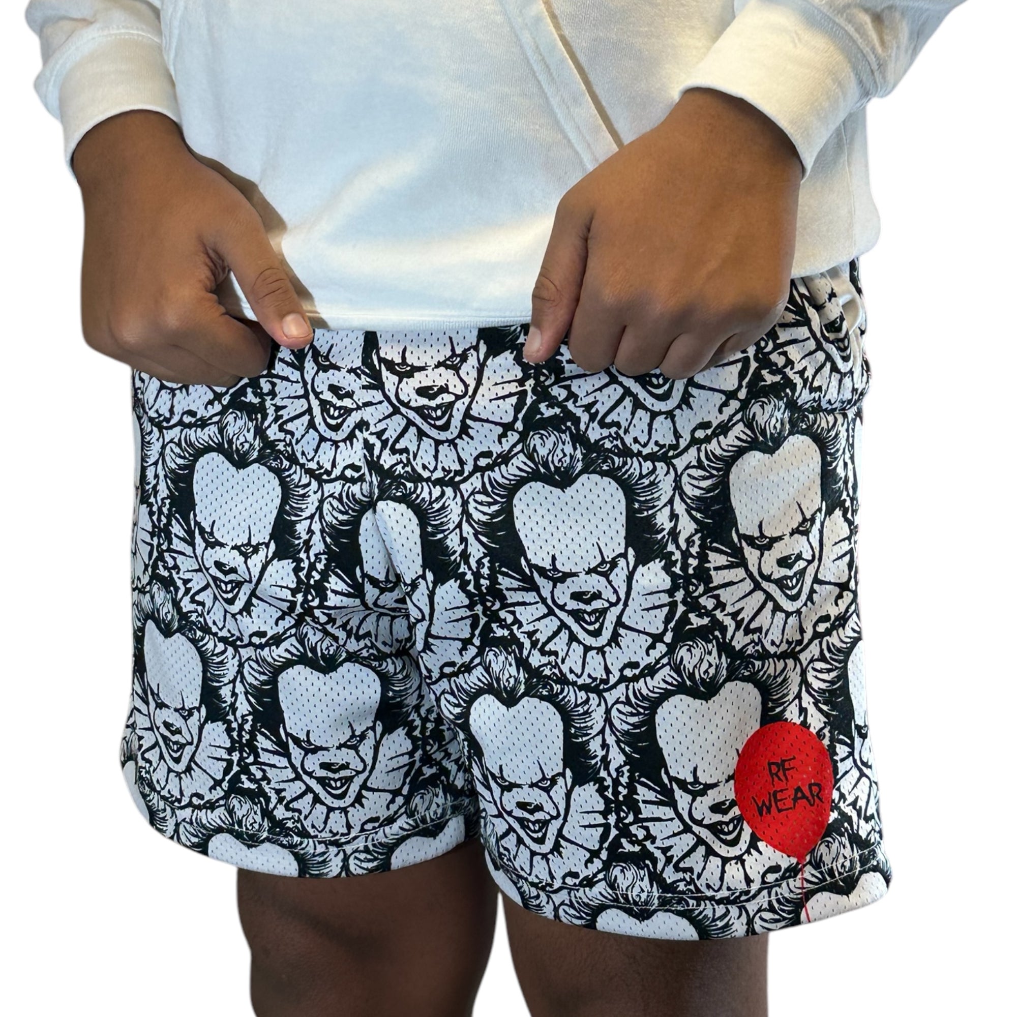 Man wearing RF-Wear Men's Mesh Horror Clown Shorts in Black/White