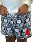 Man wearing RF-Wear Men's Mesh Horror Clown Shorts in Black/White