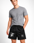 Woman wearing a grey t-shirt and RF-Wear Men's Mesh Hound Dog Shorts in Black