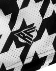 Close-up of RF-Wear Men's Mesh Houndstooth Shorts in Black/White with RF logo