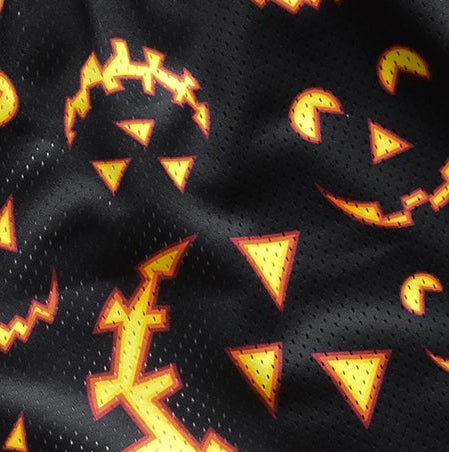 Close-up of RF-Wear Men's Mesh Jack-O-Lantern 2.0 Shorts in Black/Orange