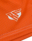 Close-up of RF-Wear Men's Mesh Jack-O-Lantern Face Shorts in Orange/Black with RF logo 
