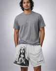 Man wearing a grey t-shirt and RF-Wear Men's Mesh Mary Shorts in Grey