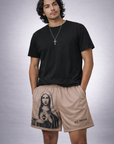 Man wearing a black t-shirt and RF-Wear Men's Mesh Mary Shorts in Tan