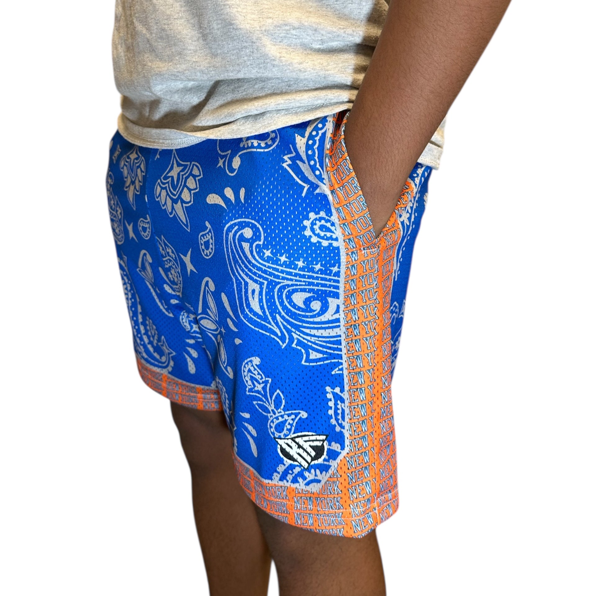 Man wearing RF-Wear Men's Mesh New York Paisley Basketball -in Blue/Orange/Black