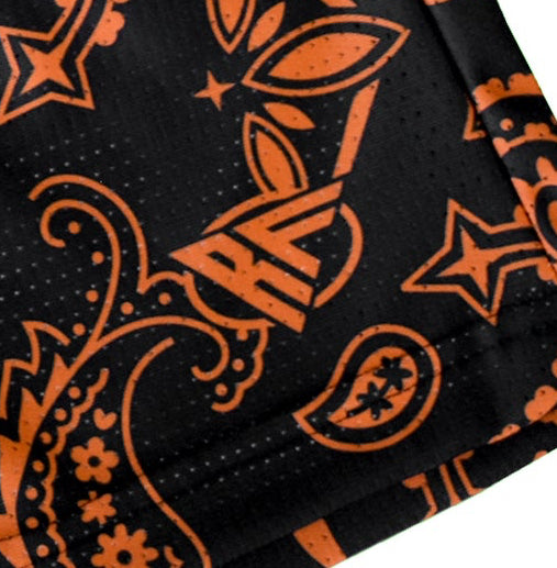 Close-up of RF-Wear Men's Mesh Paisley Shorts in Black/Orange with RF logo