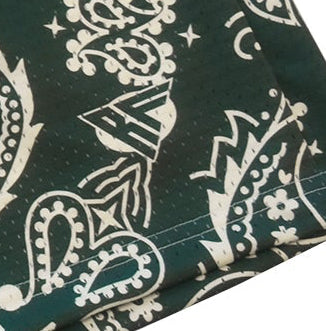 Close-up of RF-Wear Men's Mesh Paisley Shorts in Pine-Green/Cream wutg RF logo