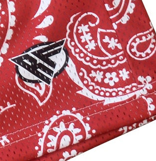 Close-up of RF-Wear Men's Mesh Paisley Shorts in Red/White with RF logo