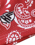 Close-up of RF-Wear Men's Mesh Paisley Shorts in Red/White with RF logo