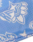 Close-up of RF-Wear Men's Mesh Paisley Shorts in Sky-Blue/White with RF logo