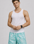 Man wearing a white tank top and RF-Wear Men's  Mesh Paisley Shorts in Teal/White