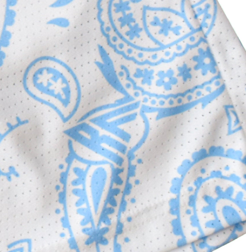 Close-up of RF-Wear Men's Mesh Paisley Shorts in White/Sky Blue with RF logo