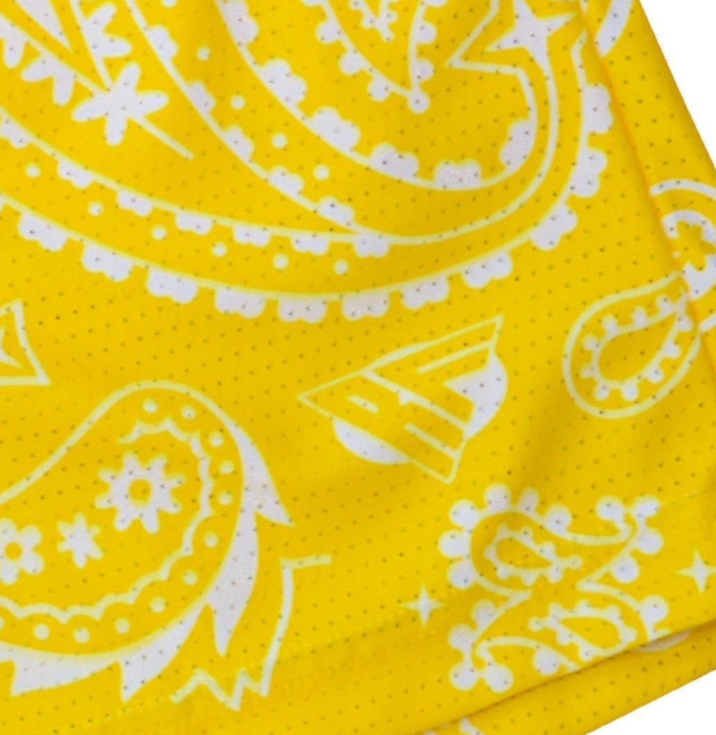 Close-up of RF-Wear Men's Mesh Paisley Shorts in Yellow/White with RF logo