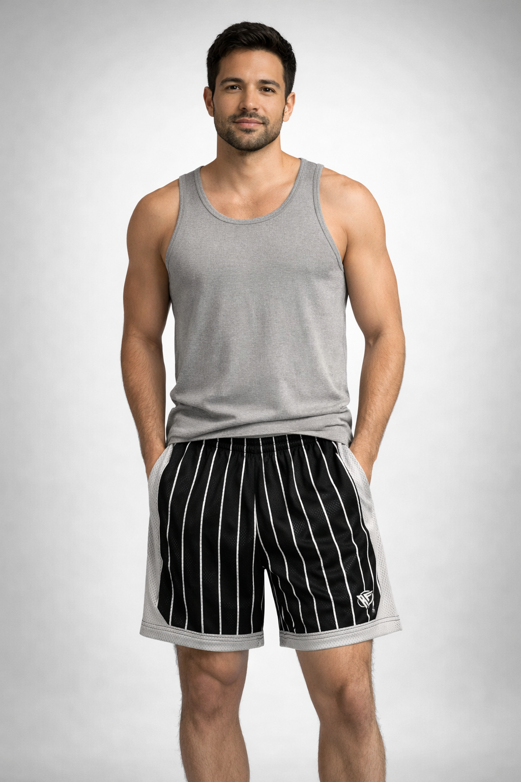 Man wearing a grey tank top and RF-Wear Men's Mesh Pinstripe Basketball Shorts in Black/White