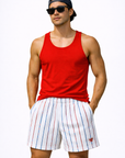 Man wearing a red tank top and RF-Wear Men's Mesh Pinstripe Shorts in White/Blue/Red