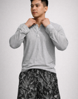 Man wearing a grey long sleeve shirt and RF-Wear Men's Mesh Floral Porcelain Shorts in Black/Grey 
