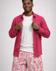 man wearing a white t-shirt and RF-Wear Men's Mesh Floral Porcelain Shorts in White/ Fuchsia