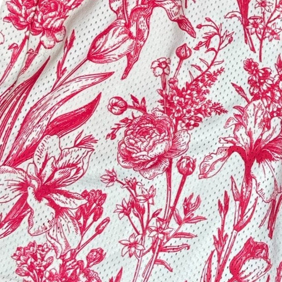 Close-up of RF-Wear Men's Mesh Floral Porcelain Shorts in White/ Fuchsia