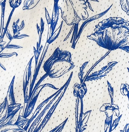 Close-up of RF-Wear Mens Mesh Floral Porcelain Shorts in White/Blue 