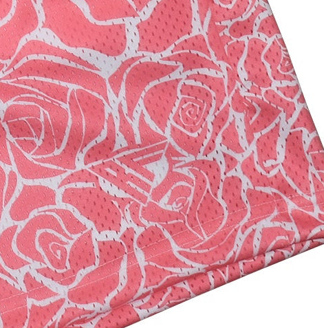 Close-up of RF-Wear Men's Mesh Floral Rose Shorts in Pink with RF logo