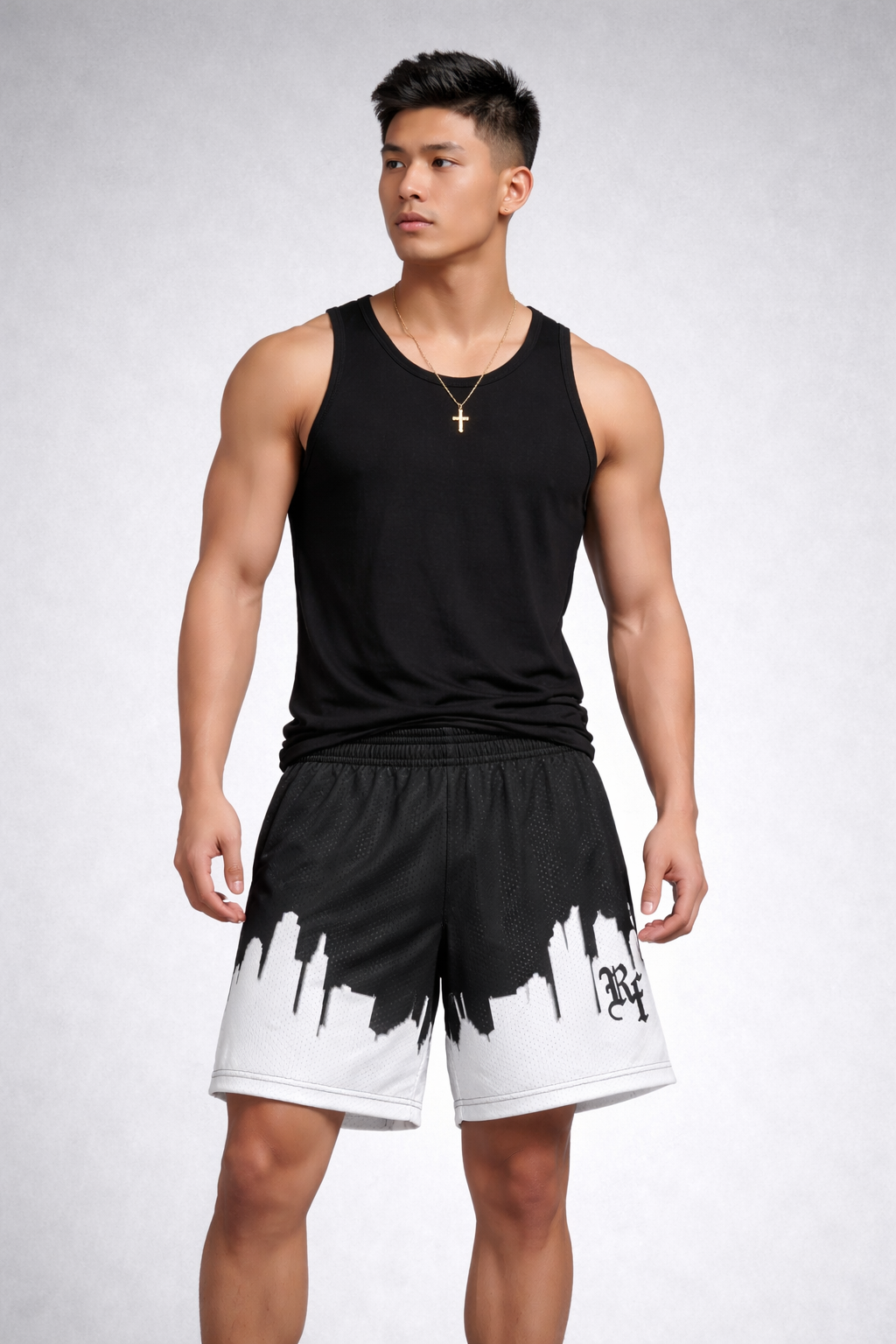 Man wearing a black tank top and RF-Wear Men's Mesh Skyline Shorts in Black