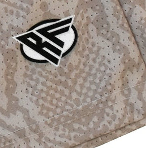 Close-up of RF-Wear Men's Mesh Snakeskin Shorts in Cream/Tan with RF logo