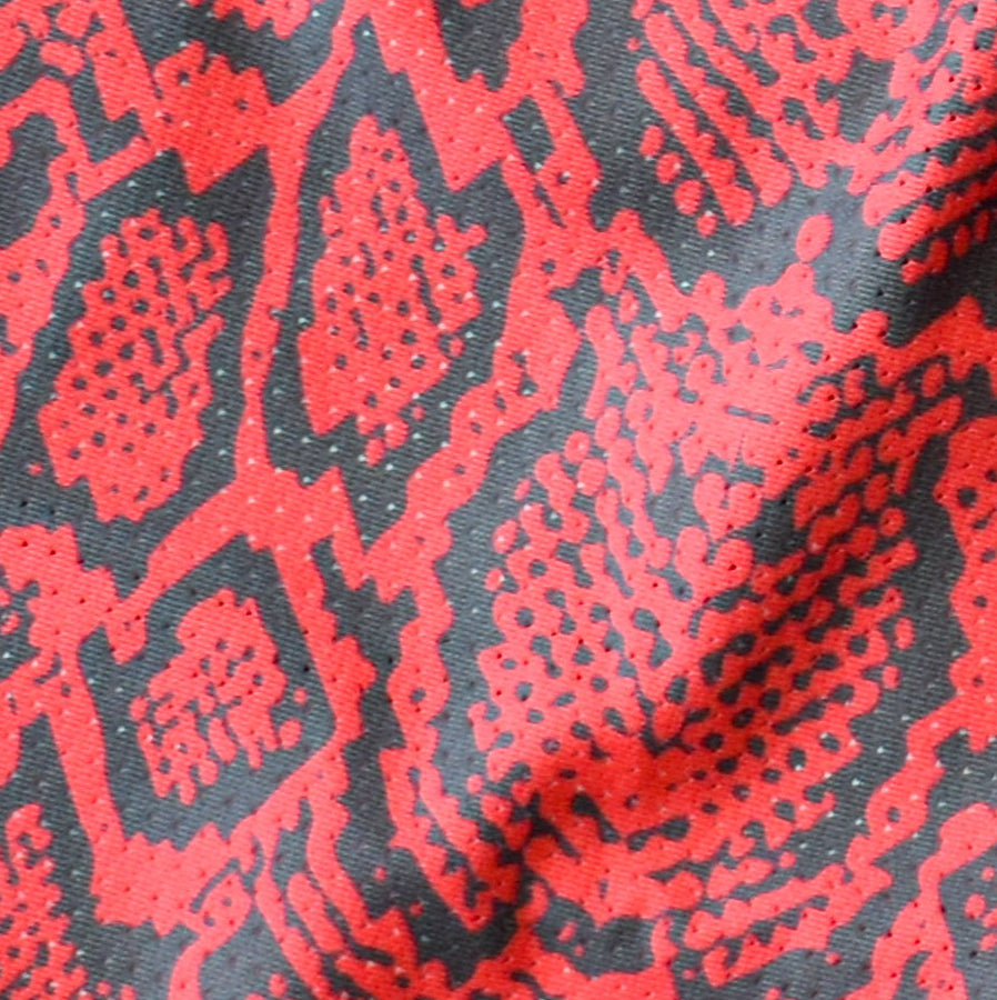 Close-up of RF-Wear Men's Mesh Snakeskin Shorts in Red