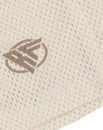 Close-up of RF-Wear Men's Mesh Solid Color Shorts in Cream with RF logo