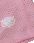 Clos-up of RF-Wear Men's Mesh Solid Color Shorts in Pink with RF logo