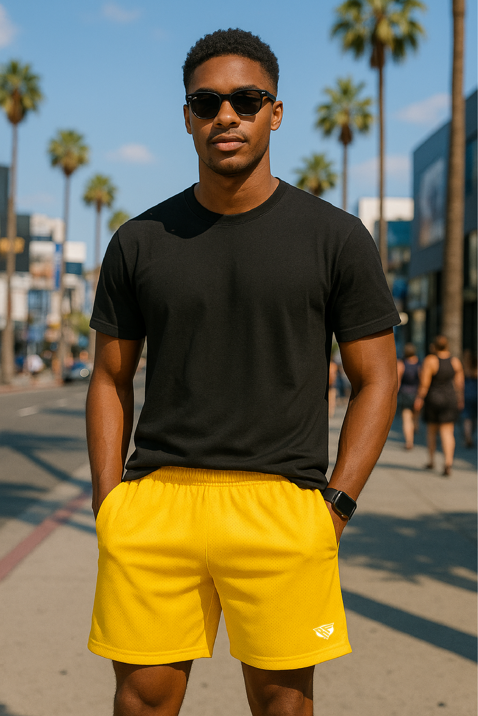 Man wearing a black t-shirt and RF-Wear Men's Mesh Solid Color  Shorts in Yellow