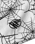 Close-up of RF-Wear Men's Mesh Spider Web Shorts in White with RF logo