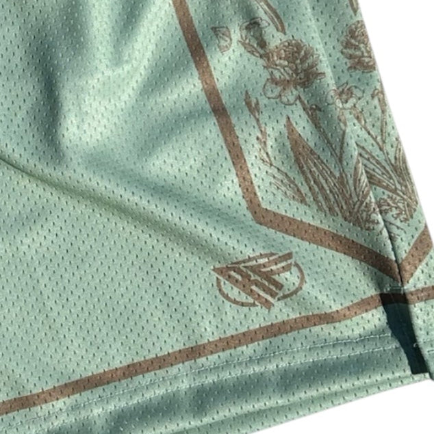 Close-up of RF-Wear Men's Mesh Split Porcelain on the Side Shorts in Seacrest/Incense with RF logo