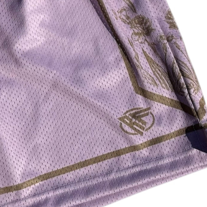Close-up of RF-Wear Men's Mesh Split Porcelain on the Side Shorts in Pink-Lilac/Incense with RF logo
