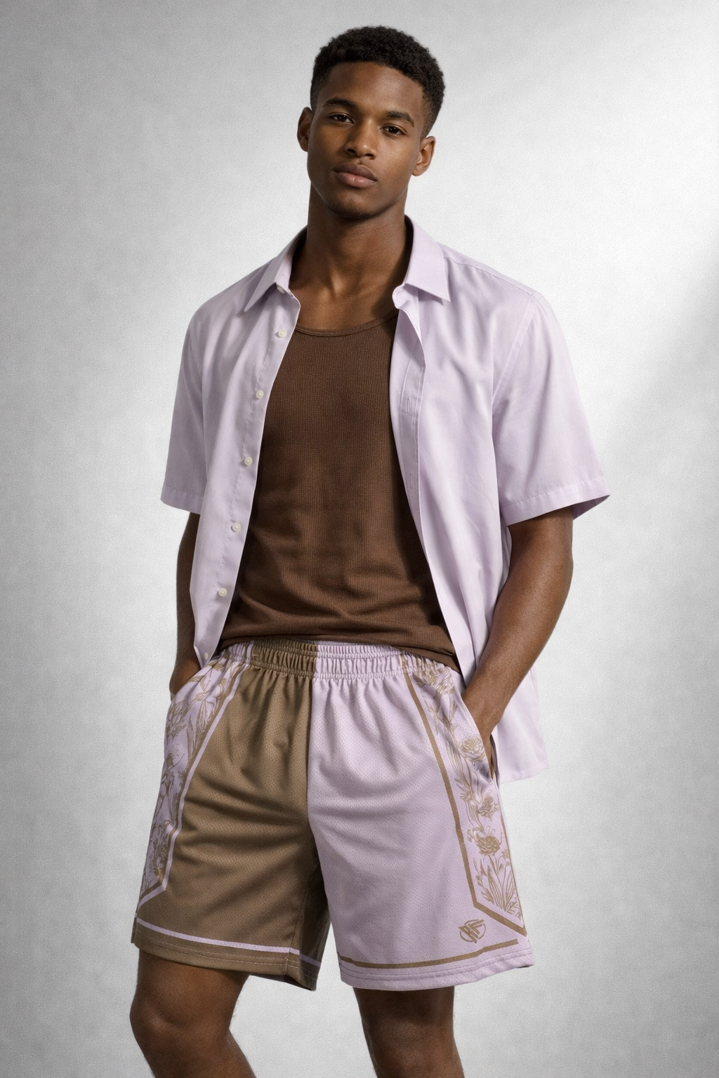 Man wearing a brown tank top and a lilac unbuttoned short sleeve dress shirt and RF-Wear Men's Mesh Split Porcelain on the Side Shorts in Pink-Lilac/Incense