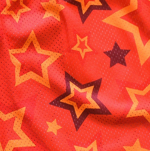 Close-up of RF-Wear Men's Mesh Star Shorts in Red/Orange 