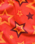 Close-up of RF-Wear Men's Mesh Star Shorts in Red/Orange 
