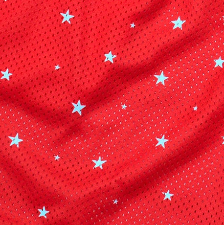 Close-up of RF-Wear Men's Mesh Star Shorts in Red with White Stars