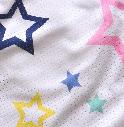 Close-up of RF-Wear Men's Mesh Star Shorts in White/Multicolor