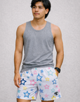 Man wearing a grey tank top and RF-Wear Men's Mesh Star Shorts in White/Multicolor