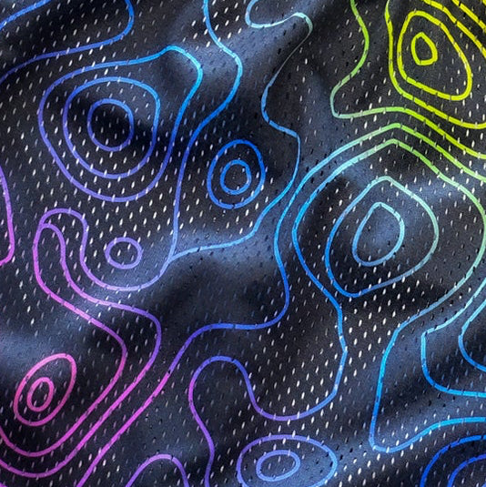 Close-up of Men's Mesh Topography Shorts in Black/Multicolor