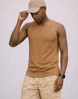 Man wearing a top and RF-Wear Men's Mesh Topography Shorts in Cream/Tan 