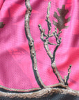 Close-up of RF-Wear Men's Mesh Tree Camo Shorts in Pink
